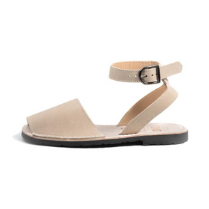 Buckle sandals in soft beige sand colour.