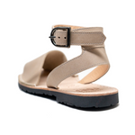 Buckle sandals in soft beige sand colour.