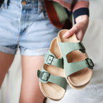 Close up of Leather Slides in Sage colour